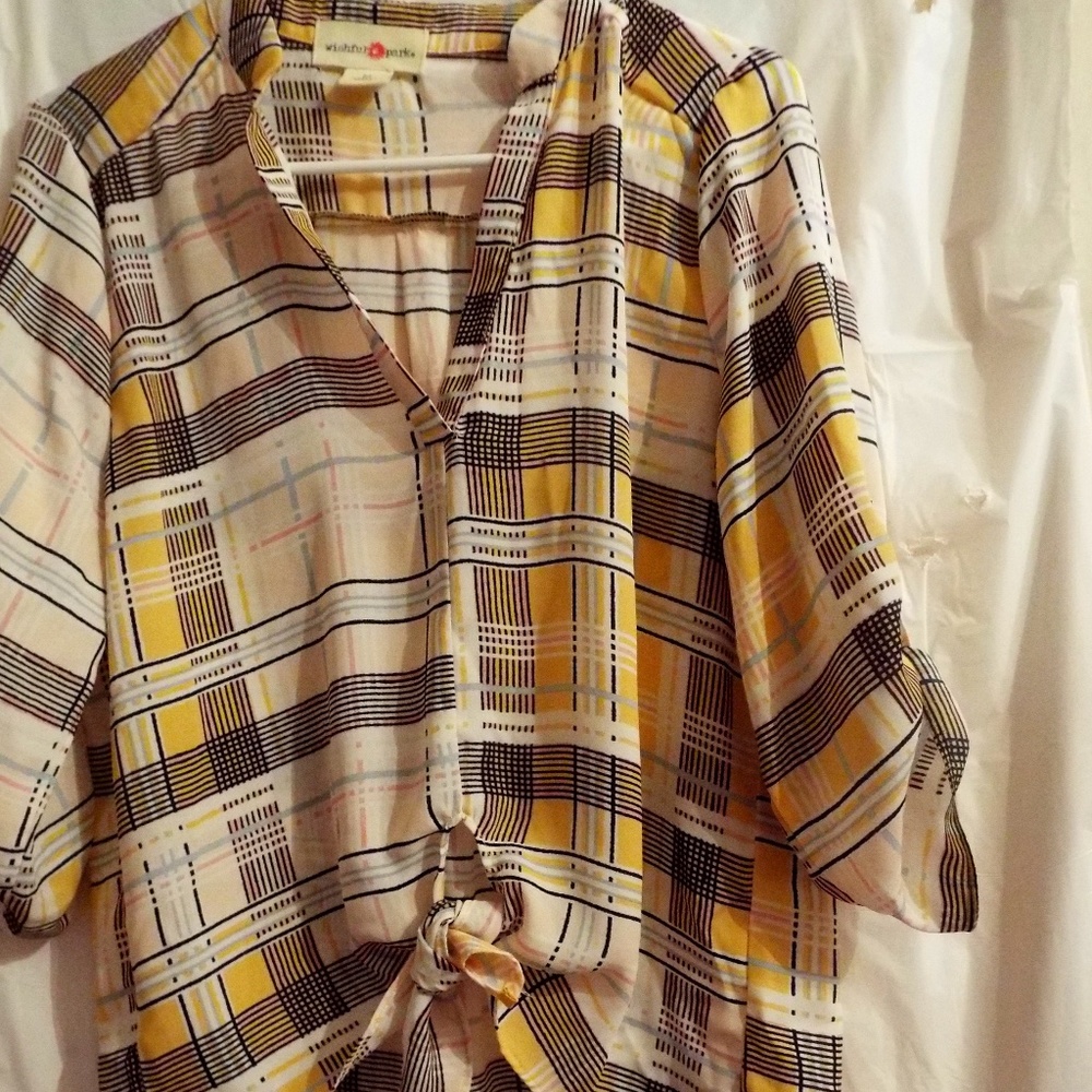 very beautiful blouse with a yellow plaid design button up mid sleeve
